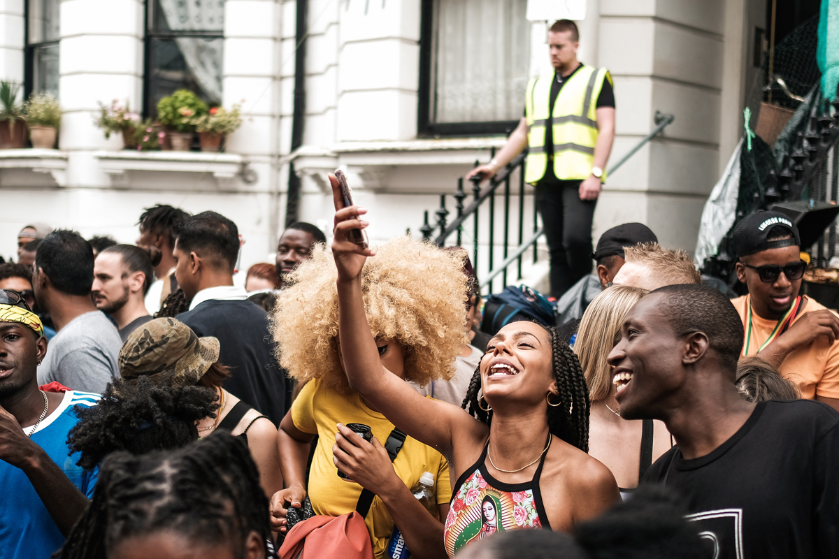 People looking happy during Notting Hill Carnival